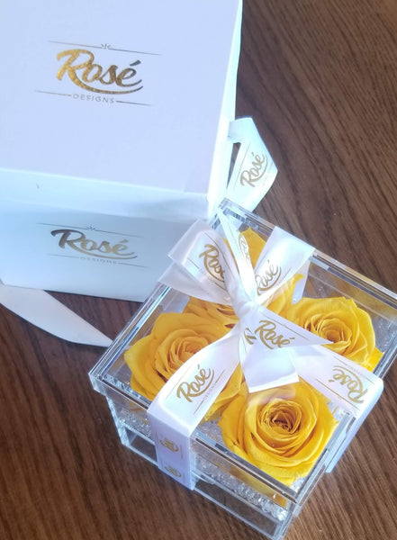 Four Yellow Eternal Roses in Clear Keepsake Box