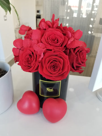 Red Roses and Hydrangeas Bouquet in Black Vase