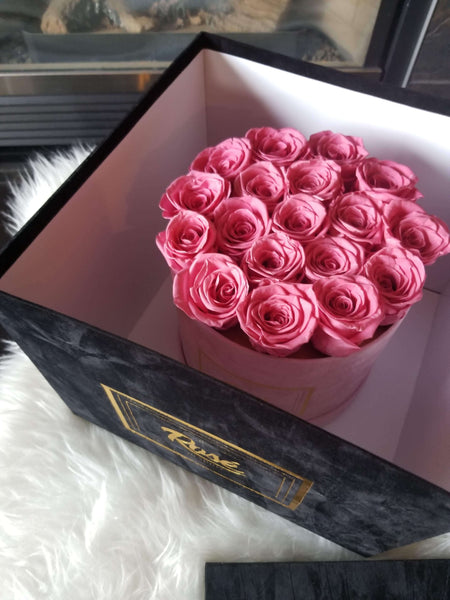 Pink Forever Roses inside black velvet box