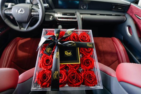 Red Rose Box inside Lexus with red leather