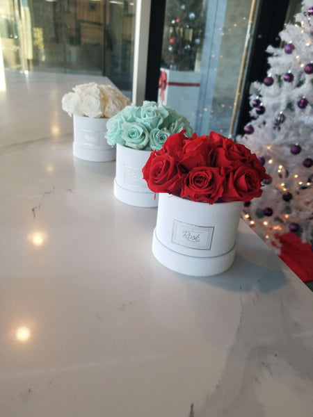 Red, Tiffany Green and white rose bouquets